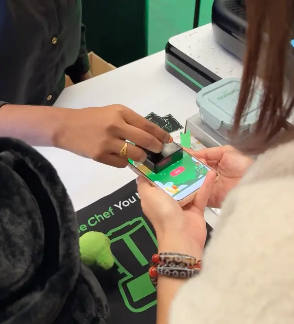 Guest collecting a stamp on their phone passport for completing an eco-action