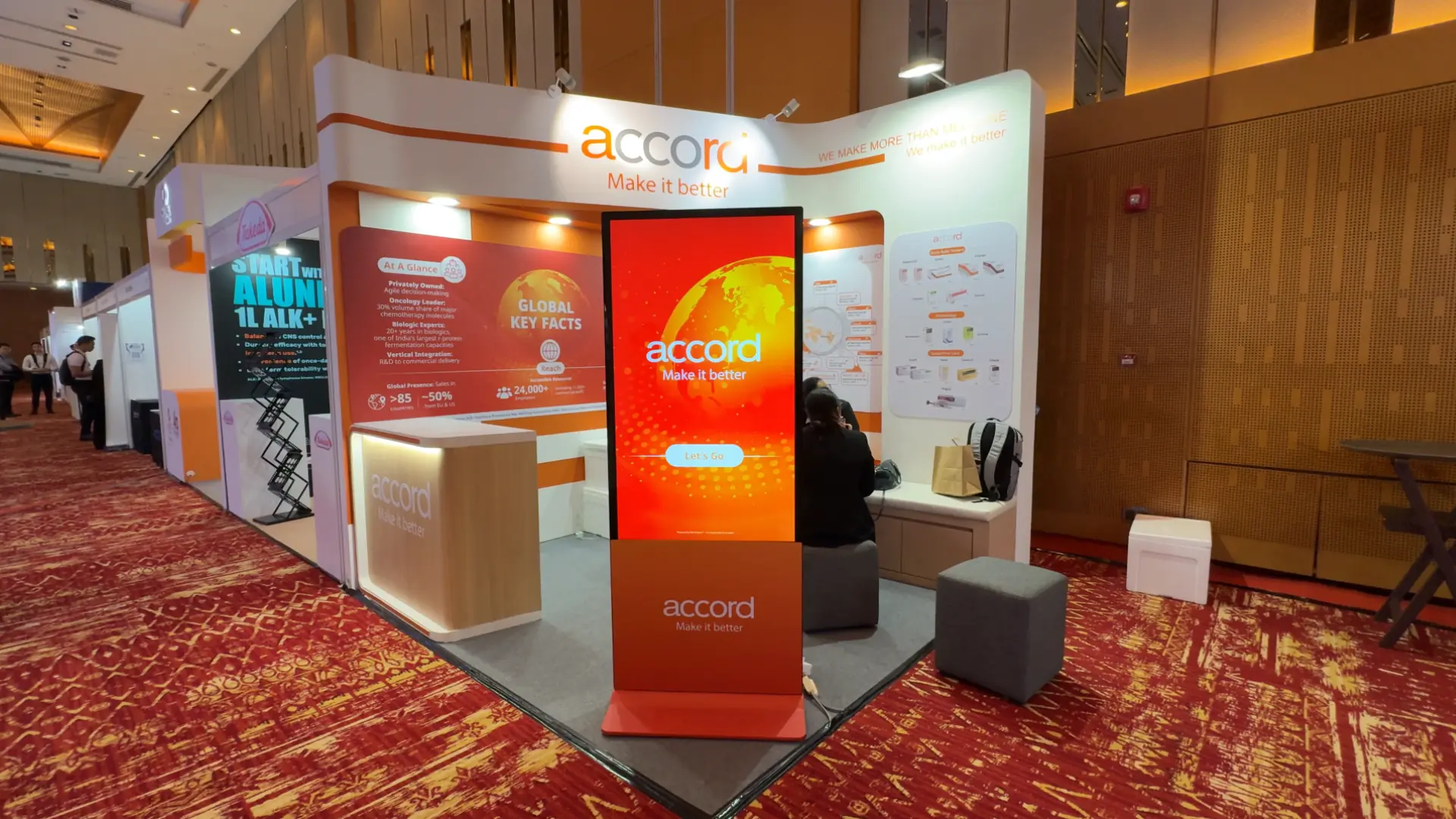 Accord Healthcare touchscreen knowledge game kiosk at the KLCC medical congress booth